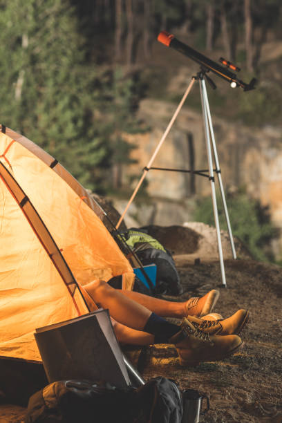 istock couple relaxing in tent 925705550
