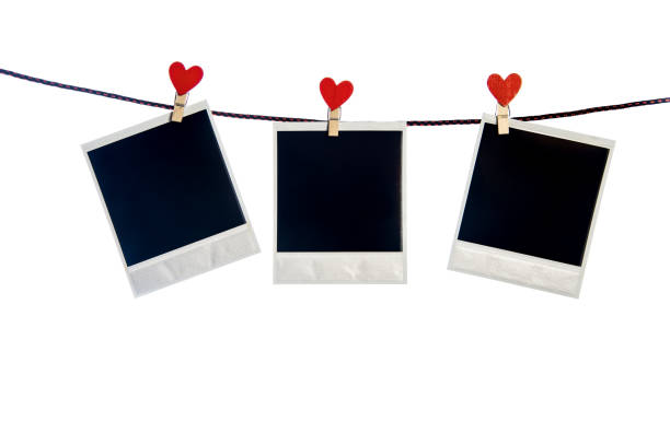 valentine card three photoframes with red heart clothepins  on string isolated on white background clothespin photos stock pictures, royalty-free photos & images