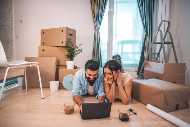 istock Happy couple moving house 925714462