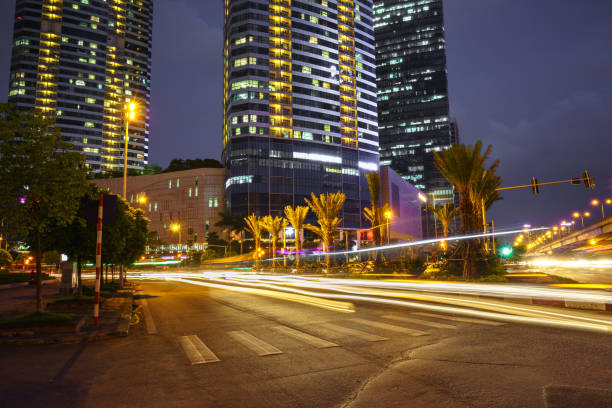 istock Night scene of modern city with light trails. 925714640