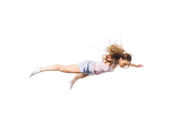 istock full length view of young woman falling and looking down isolated on white 925714886