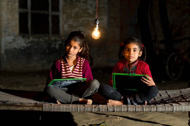 istock Rural girls studying in light bulb 925720242