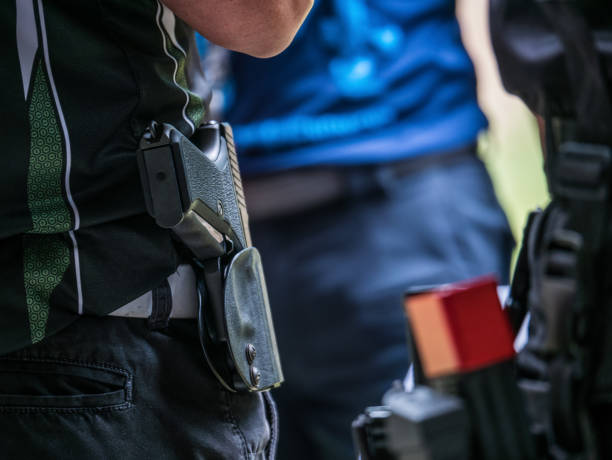 istock males with handgun in holster standby for shooting competion 925722124