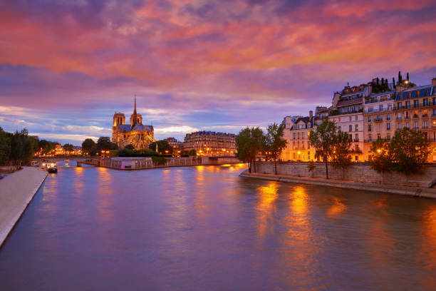 istock Notre Dame cathedral Paris sunset at Seine 925722322