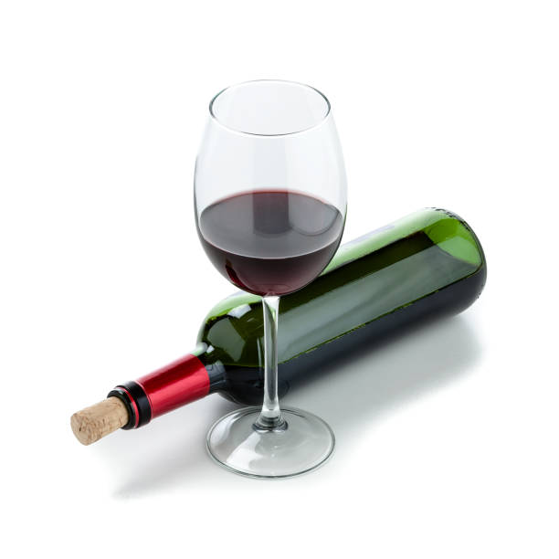 istock Wineglass and half full wine bottle 925732102