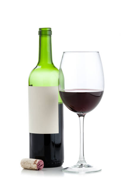 istock Wineglass and open half full wine bottle 925732126