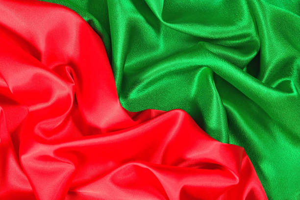 istock Natural red and green satin fabric texture 925732688