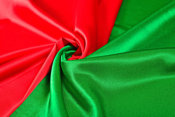 istock Natural red and green satin fabric texture 925733098