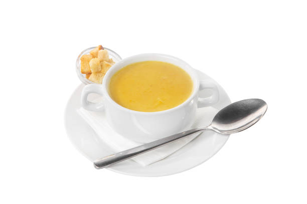 istock Soup in a white plate isolated white 925734624