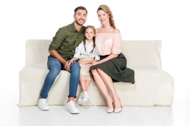 istock happy family resting on sofa together isolated on white 925738178