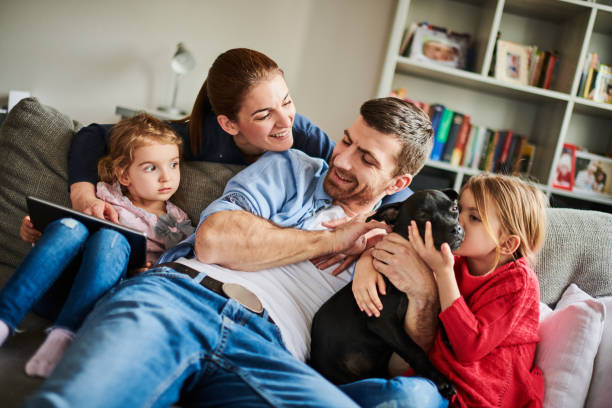 istock Family with children and a dog 925738332