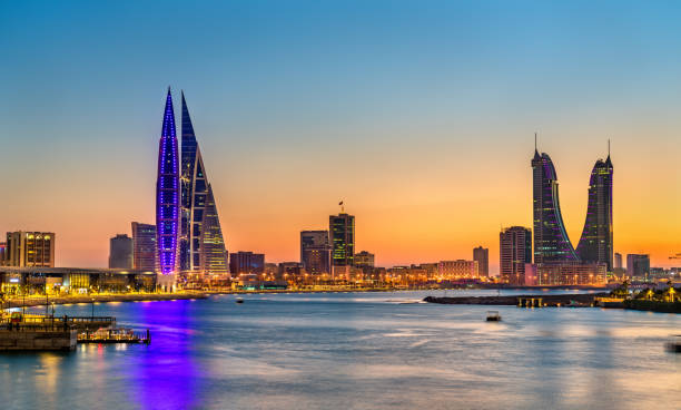 Skyline of Manama at sunset. The Kingdom of Bahrain Skyline of Manama at sunset. The capital of Bahrain manama stock pictures, royalty-free photos & images