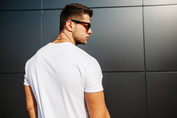 istock Hipster wearing white blank t-shirt with empty space for your design 925745654