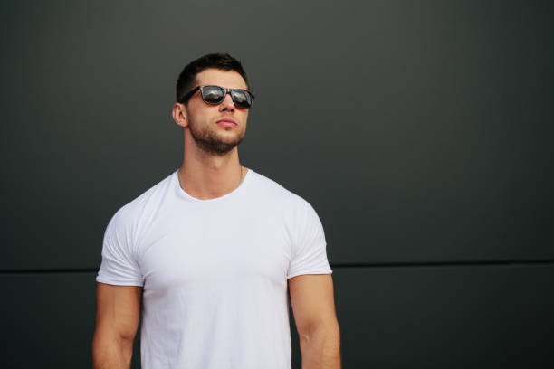istock Hipster wearing white blank t-shirt with empty space for your design 925745736