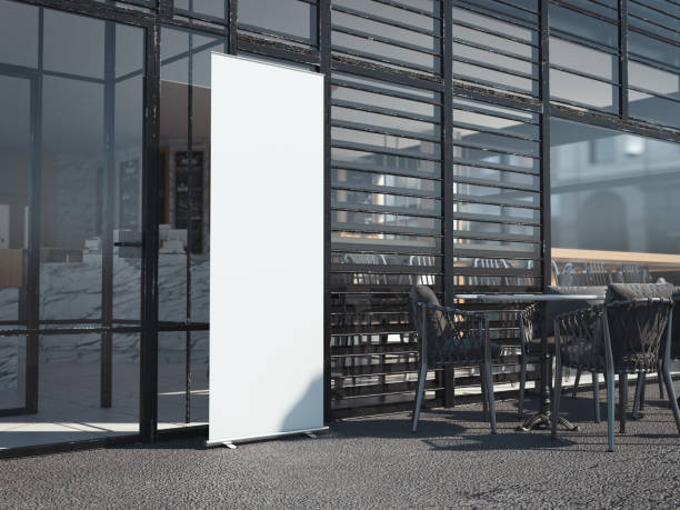 istock White blank rollup banner near restaurant. 3d rendering 925746736