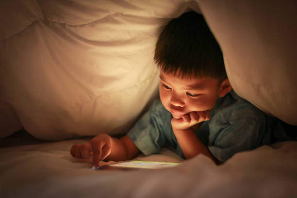 istock Kid using tablet for watch online cartoon. 925749296