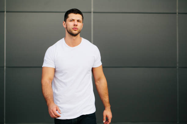 istock Hipster wearing white blank t-shirt with empty space for your design 925749332