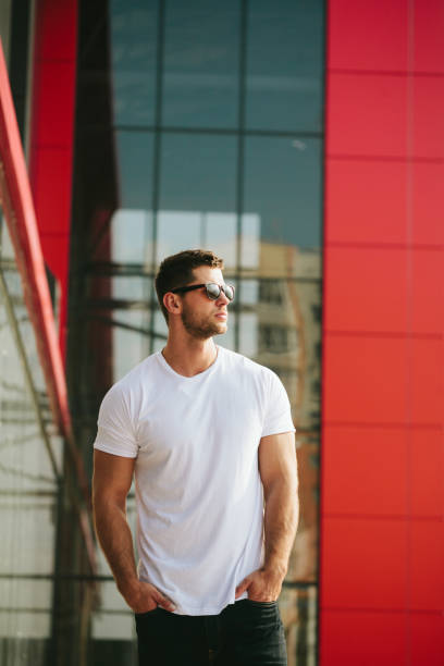 istock Hipster wearing white blank t-shirt with empty space for your design 925749698