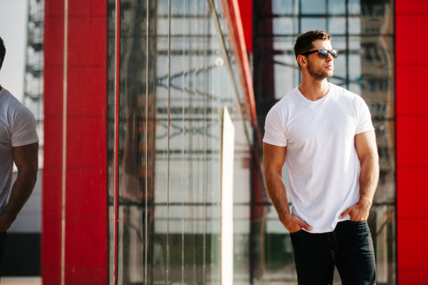 istock Hipster wearing white blank t-shirt with empty space for your design 925749786