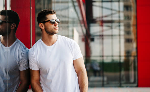 istock Hipster wearing white blank t-shirt with empty space for your design 925749892