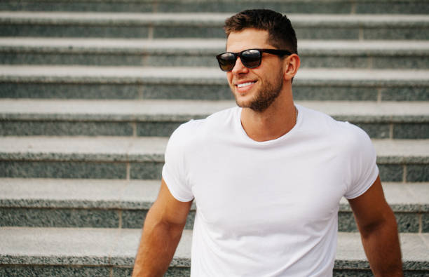 istock Hipster wearing white blank t-shirt with empty space for your design 925750060
