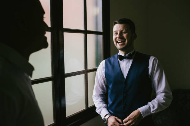 Groom getting ready for the wedding Brazilian groom getting ready for the wedding godfather godparent stock pictures, royalty-free photos & images