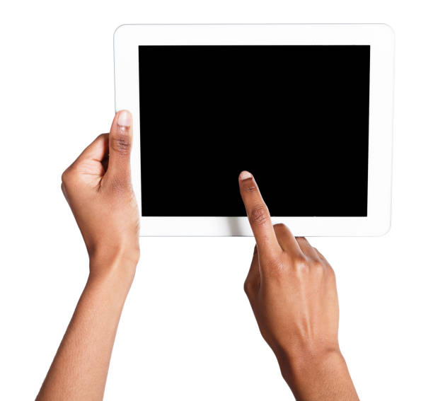 Holding and pointing to blank screen on tablet Holding and pointing to blank screen on digital tablet. African-american female hands using device with blank screen, copy space for advertisement, isolated on white background human finger human hand pointing isolated stock pictures, royalty-free photos & images