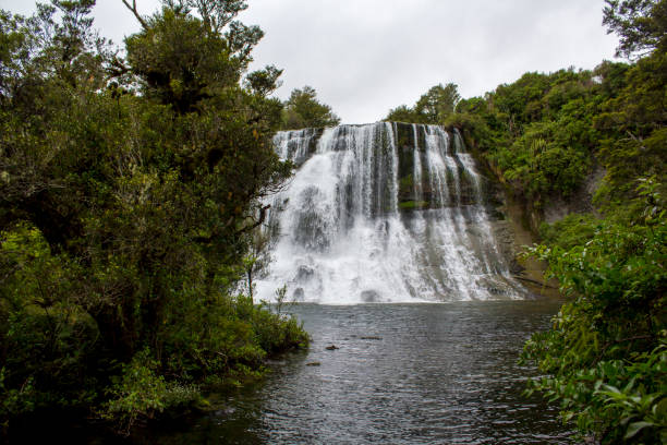 istock Waterfall and stream in New Zealand 925762228