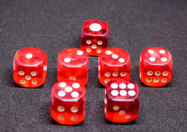 istock Bones for playing poker in red on a dark background.  One to six. 925766122