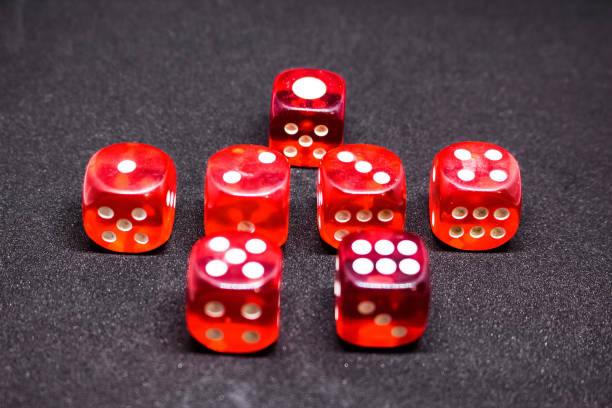 istock Bones for playing poker in red on a dark background.  One to six. 925766124