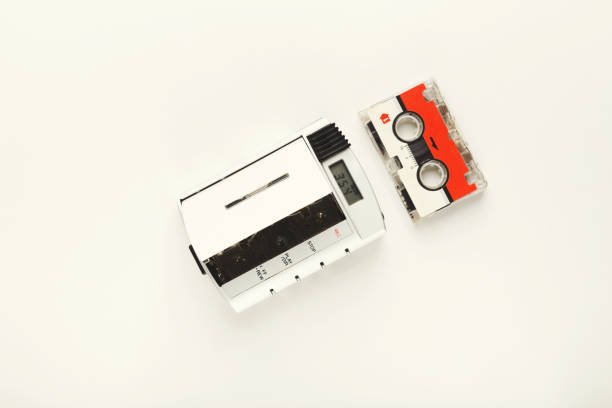 istock Vintage walkman and cassette tape on white isolated background 925767320