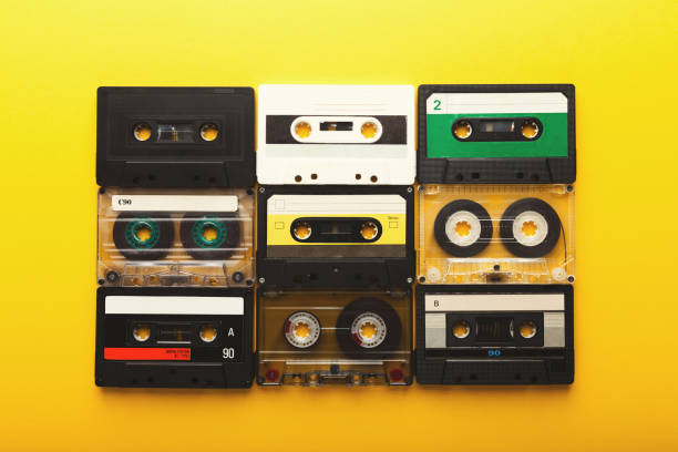 istock Vintage audio cassettes on yellow background 925767410