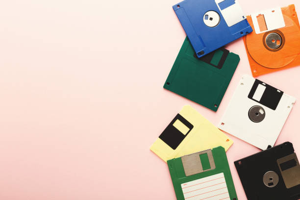 istock Retro floppy disks isolated on pink background 925769922