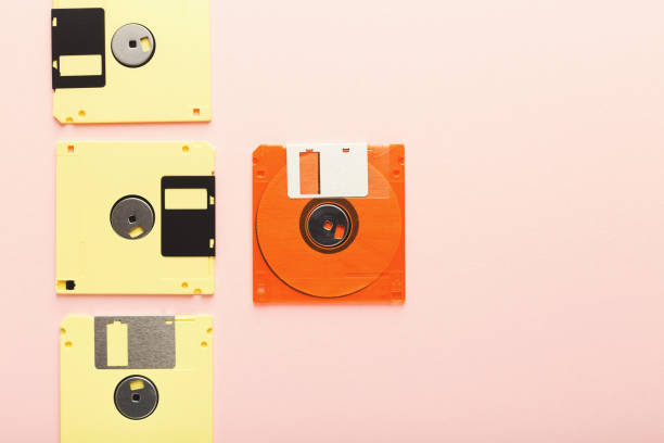 istock Creative background with floppy disks of different colors 925770046