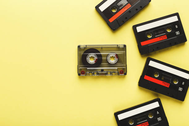 istock Creative background with cassette tapes of different colors 925770202