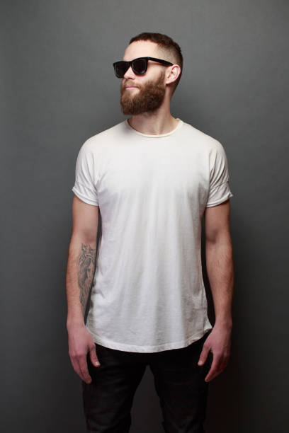 istock Hipster handsome male model with beard wearing white blank t-shirt 925771234