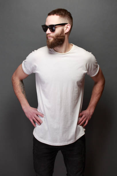 istock Hipster handsome male model with beard wearing white blank t-shirt 925771524