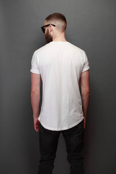 istock Hipster handsome male model with beard wearing white blank t-shirt 925774968