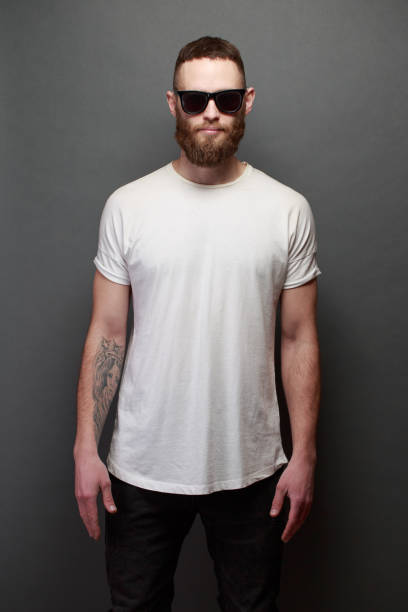 istock Hipster handsome male model with beard wearing white blank t-shirt 925777078