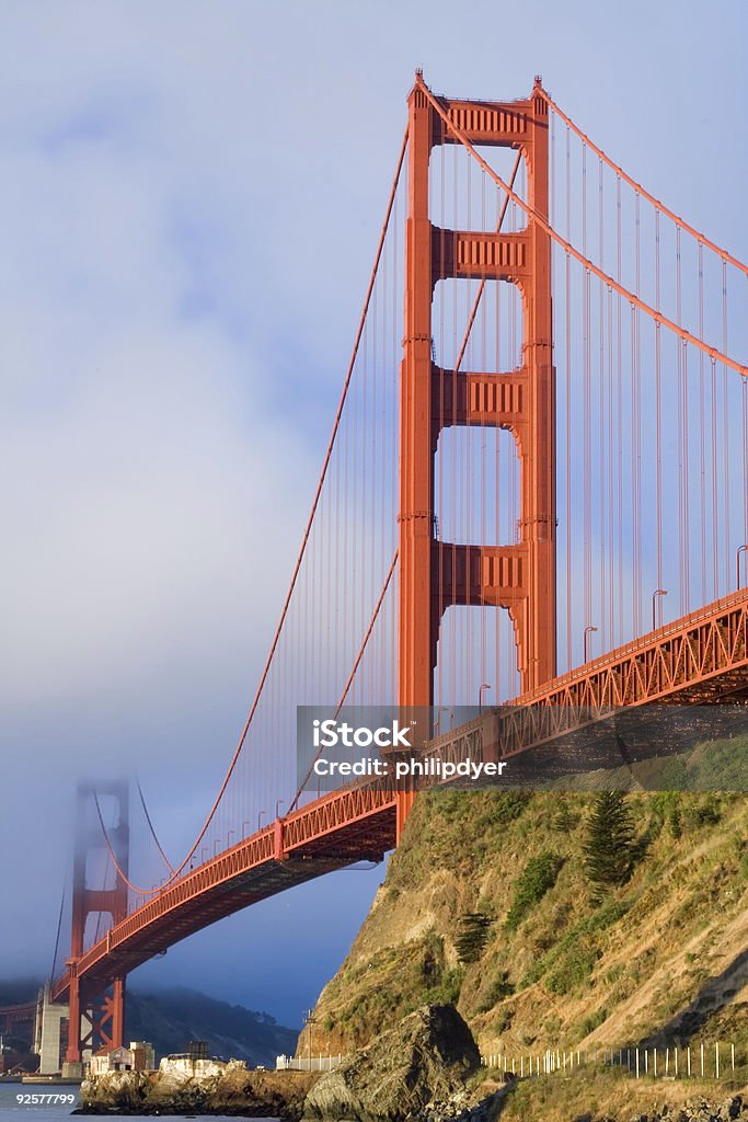 Golden Gate Bridge in Fog  Bay of Water Stock Photo