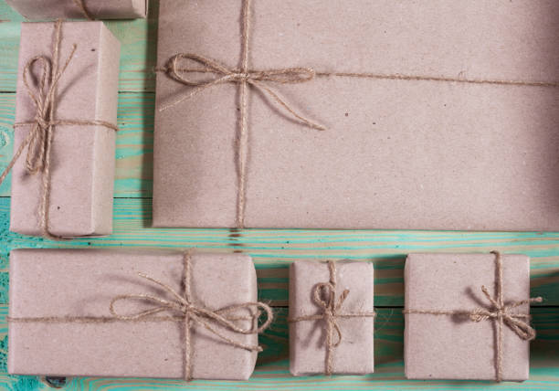 istock Gift boxes wrapped kraft paper tied with twine 925778318