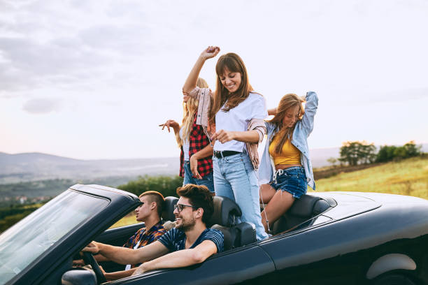 istock Friends riding in the car. 925778366