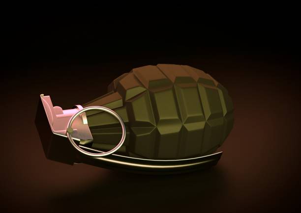 Hand grenade lying on a wooden surface, evoking the devastating impact of conflict and destruction
