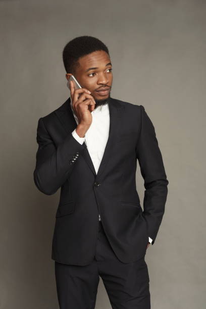 istock Handsome young black man portrait at studio background. 925782020