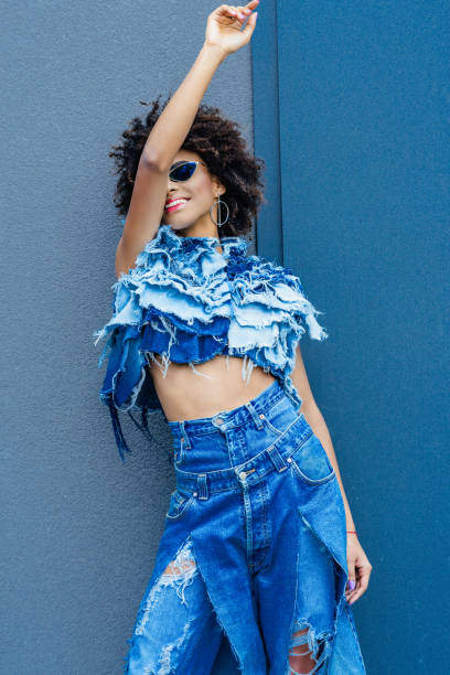 istock afro girl posing in denim clothes 925782792