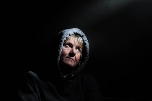 istock mature woman with serious facial expression 925783228