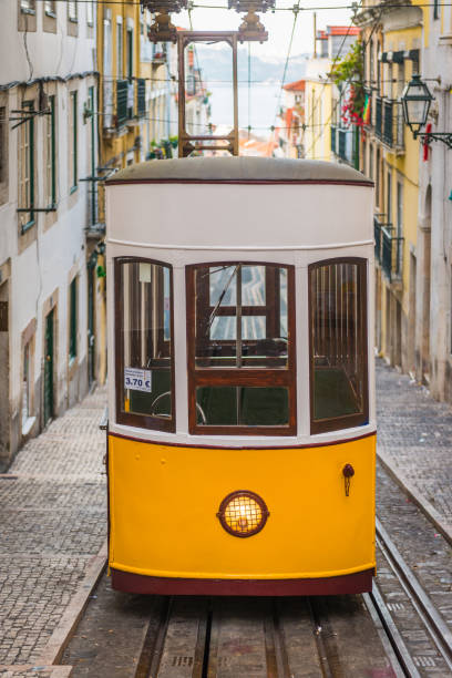 istock Lisbon iconic yellow tram funicular elevator Ascensor da Bica Portugal 925791318