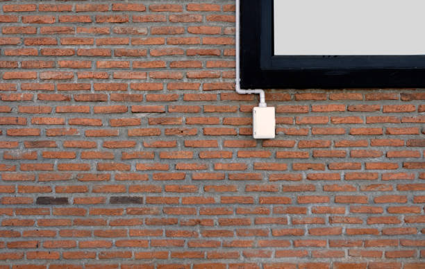 istock power outlets on the brick wall vertical orientation. 925791550