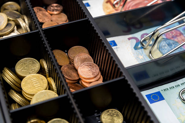 cash register with coins and paper money - cash register coin cash box checkout counter imagens e fotografias de stock