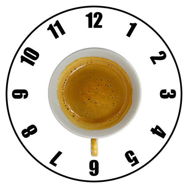 Coffee cup isolated on white background forming clock dial top view. Coffee time concept